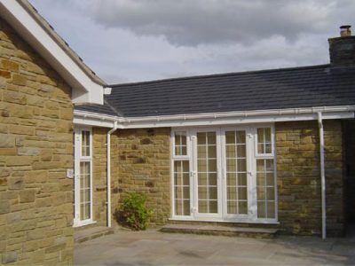 new roofline system including deep flow guttering new A rated windows and doors leeds property